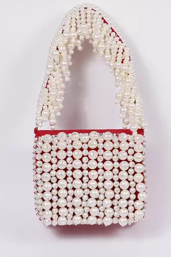Red suede mini bag with embroidered handle