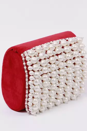 Red suede mini bag with embroidered handle