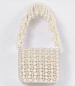 Suede white mini bag with embroidered handle