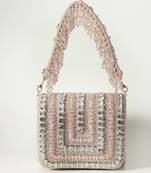 Pink suede mini bag with embroidered handle
