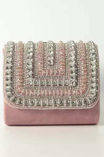 Pink suede mini bag with embroidered handle
