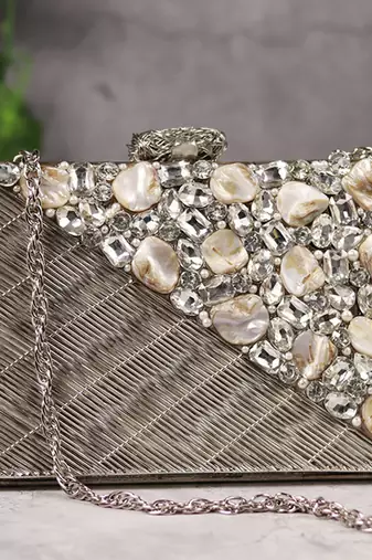 Silver beaded silver embellished brass clutch