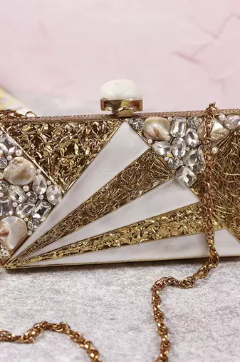Gold bead embellished mother of pearl clutch