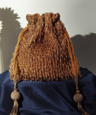 Gold suede golden potli bag with handle 4