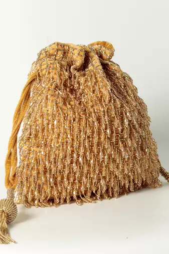 Gold suede golden potli bag with handle