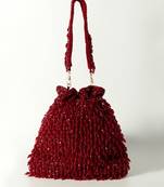 Red suede red potli bag with handle