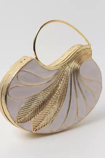 Gold embellished mother of pearl clutch with detachable chain