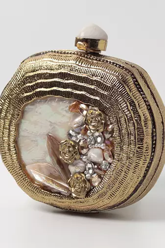 Embellished gold mother of pearl clutch