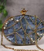 Mother of pearl gold embellished clutch
