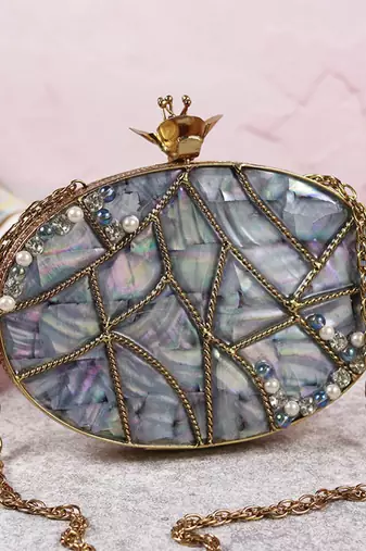 Mother of pearl gold embellished clutch