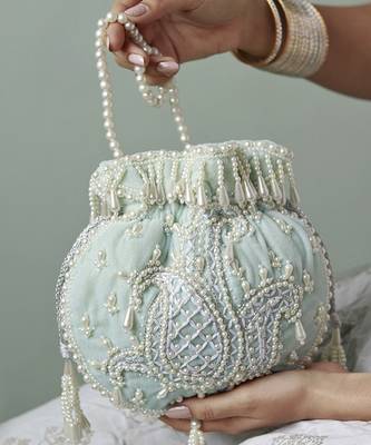 Blue suede hand embroidered potli with pearl handle 1