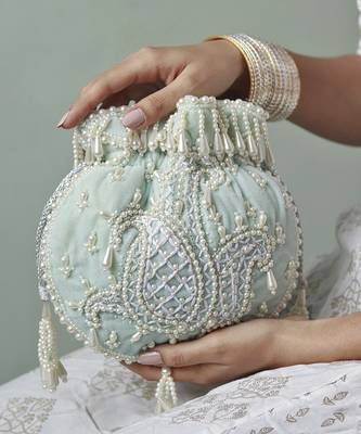 Blue suede hand embroidered potli with pearl handle 4