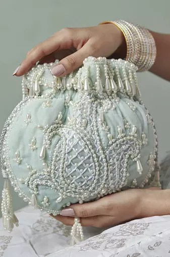 Blue suede hand embroidered potli with pearl handle