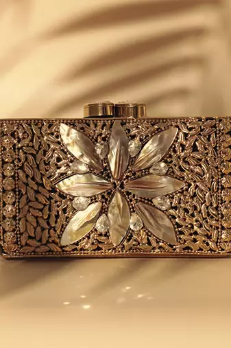 Embellished mother of pearl gold clutch