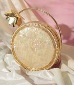 Gold embellished mother of pearl clutch