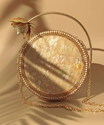 Gold embellished mother of pearl clutch 2