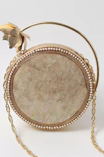 Gold embellished mother of pearl clutch