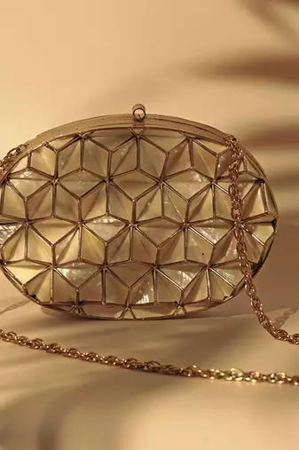 Gold embellished clutch with removeable  chain