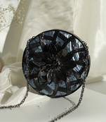 Black intricate brass work pearl clutch