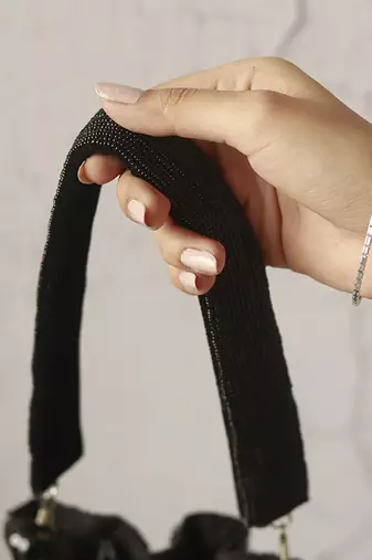 Black silk tassles potli with handle