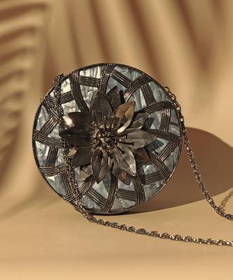 Black intricate brass work pearl clutch 2