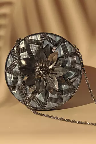 Black intricate brass work pearl clutch
