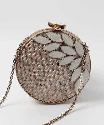 Gold pearl clutch with intricate brass work 2