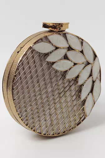 Gold pearl clutch with intricate brass work