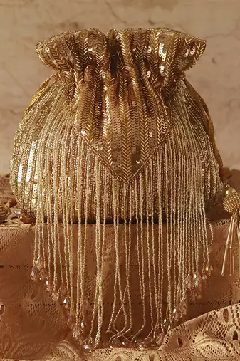Gold silk tassles potli with handle