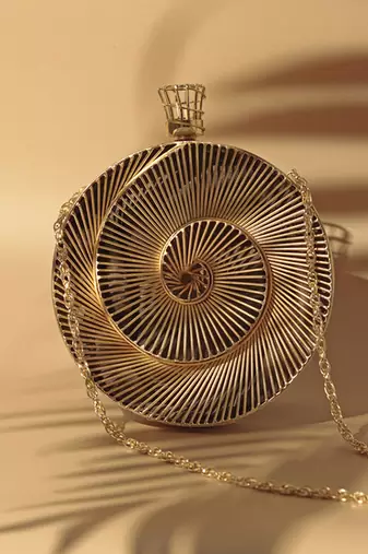Gold intricate brass wirework clutch