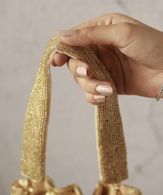 Gold silk tassles potli with handle 4