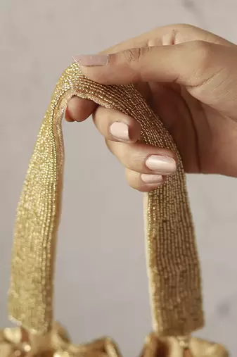 Gold silk tassles potli with handle