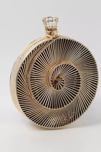 Gold intricate brass wirework clutch