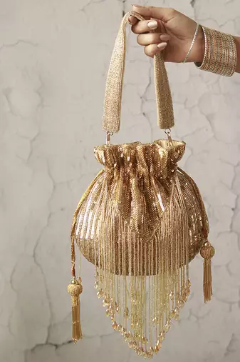 Gold silk tassles potli with handle