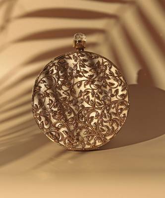 Gold intricate brass work pearl clutch 2