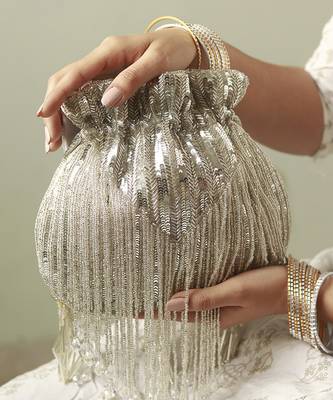 Silver silk tassles potli with handle 1