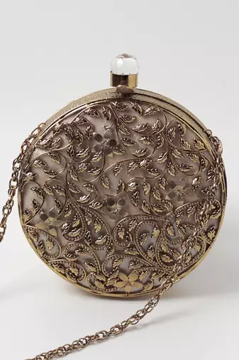 Gold intricate brass work pearl clutch