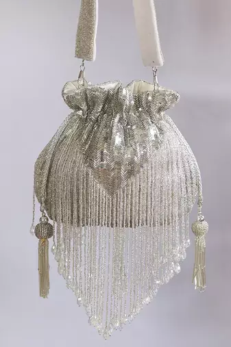 Silver silk tassles potli with handle