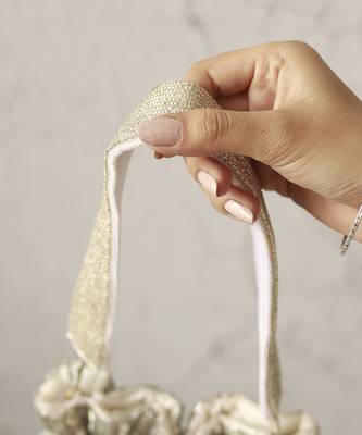 Silver silk tassles potli with handle 4