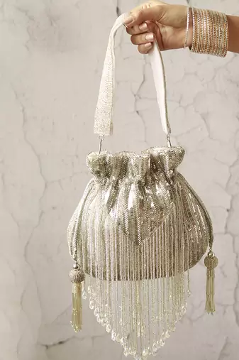 Silver silk tassles potli with handle