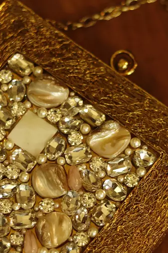 Red rose gold embellished clutch