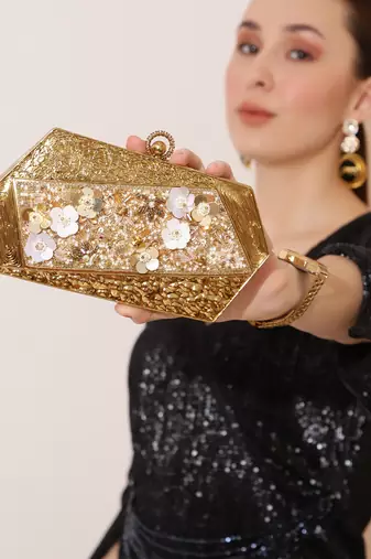 Gold embellished clutch with detachable chain