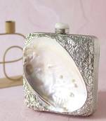 Silver clutch handcrafted with intricate detailing