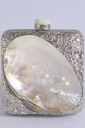 Silver clutch handcrafted with intricate detailing