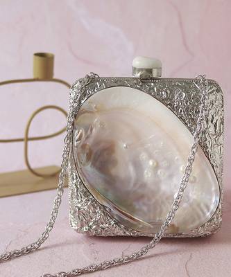 Silver clutch handcrafted with intricate detailing 5