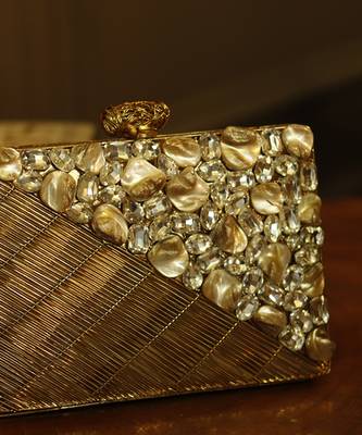 Gold beaded golden embellished brass clutch 1