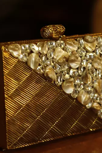 Gold beaded golden embellished brass clutch