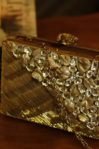 Gold beaded golden embellished brass clutch