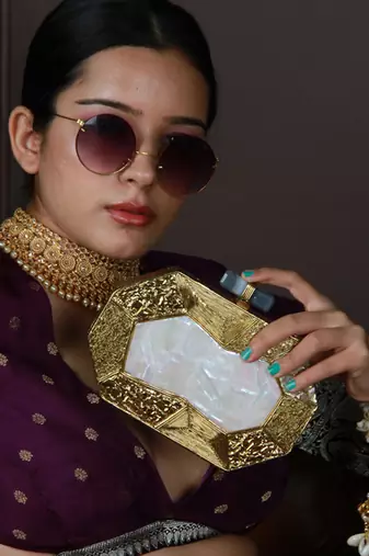 Gold brass clutch with detachable chain