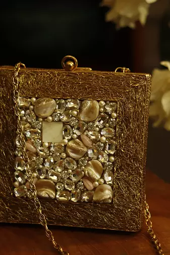 Gold embellished brass clutch for women